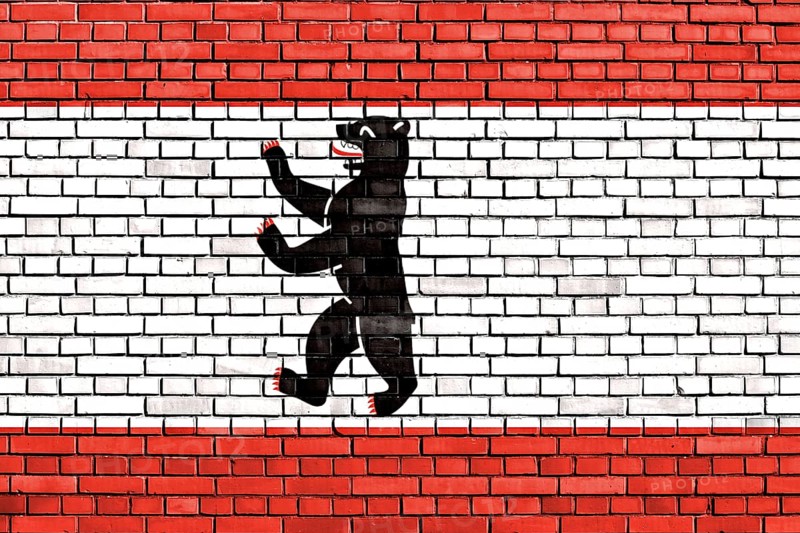 Berlin flag painted on brick wall