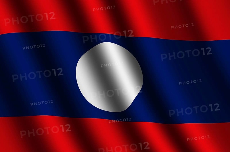 The Laotian flag flying in the wind