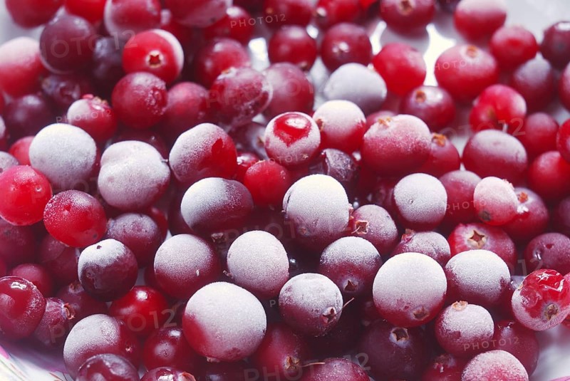 Red frozen cranberries full frame, background, horizontal