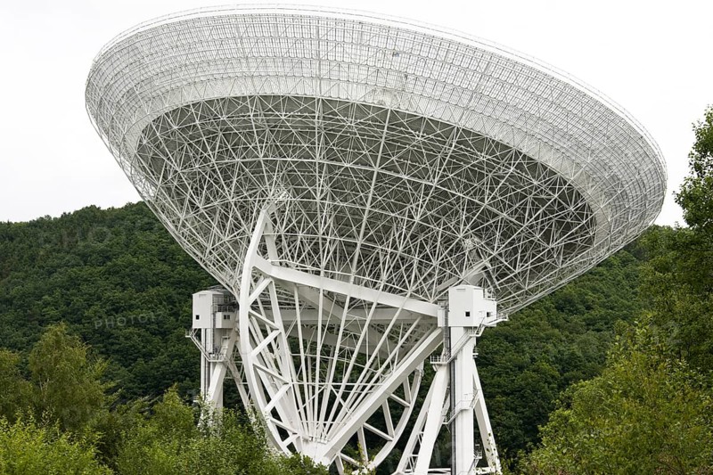 The photo shows a radio telescope