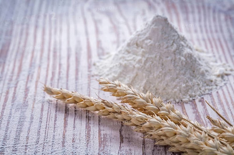 Rye wheat ears flour on wooden background food and drink concept