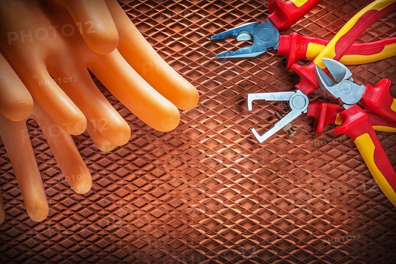 Insulation wire strippers cutter pliers insulating gloves on dielectric cover