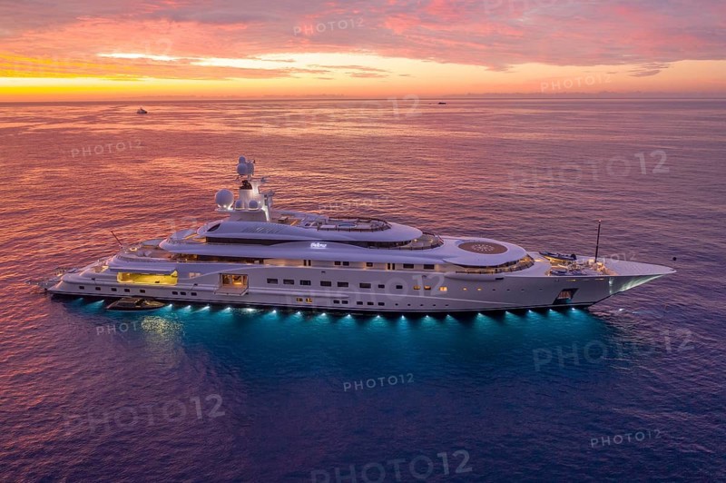 Aerial view of 115 metre motor yacht PELORUS, built in 2003 by the Bremen shipyard Lürssen Yachts for a client from Saudi Arabia, then bought by Russian oligarch Roman Abramovich and later by David Geffen, here the superyacht is anchored off the Principality of Monaco, Mediterranean Sea