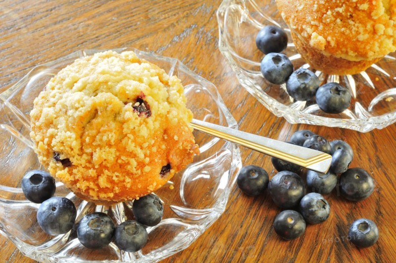 Blueberry muffins on a white plate with fresh berries, Blueberry muffins with blueberries