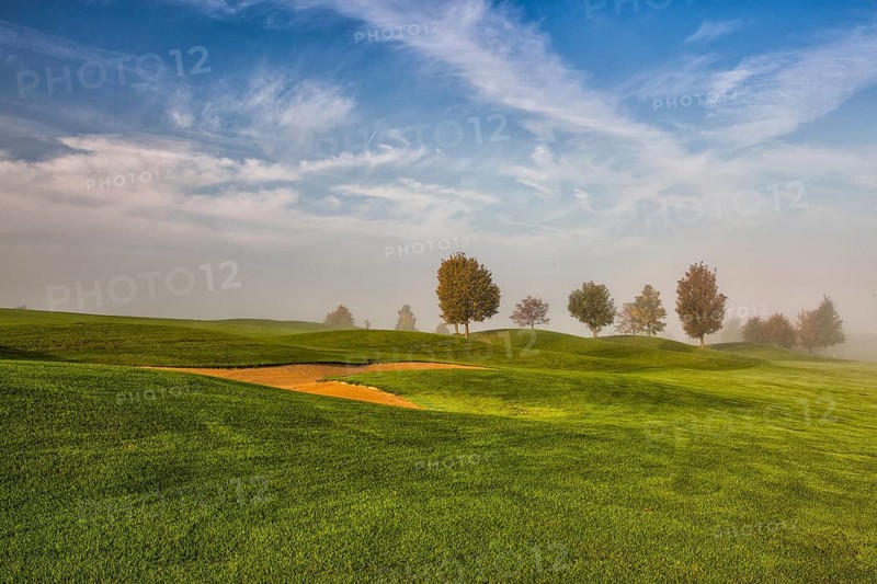 Autumn landscape on the empty golf course