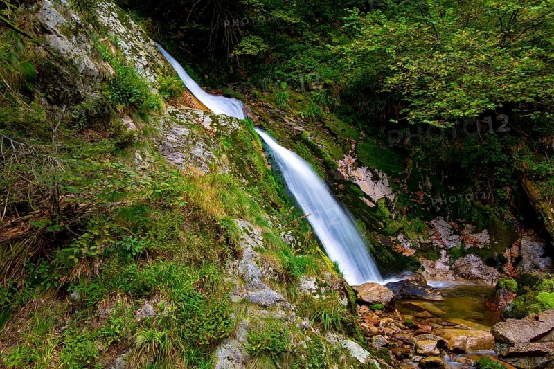 Picturesque high-water cascading waterfall Allerheiligen. The Black Forest /Schwarzwald/ - famous forest in the center of Europe. Germany. Autumn cloudy day