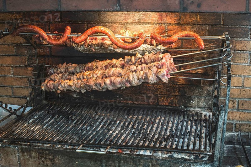 Grilled meal on a skewer in restaurant
