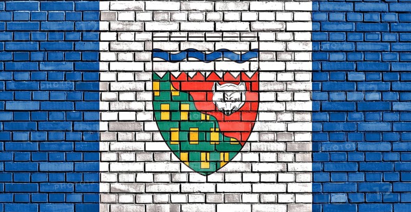 Flag of Northwest Territories painted on brick wall
