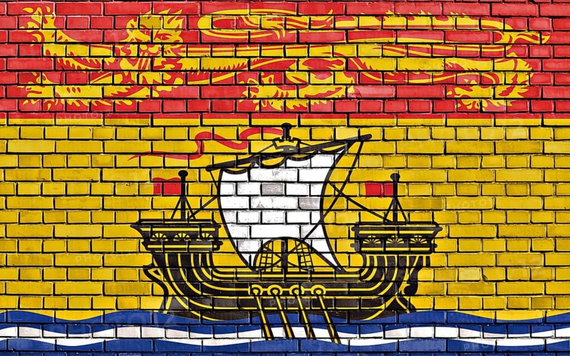 Flag of New Brunswick painted on brick wall