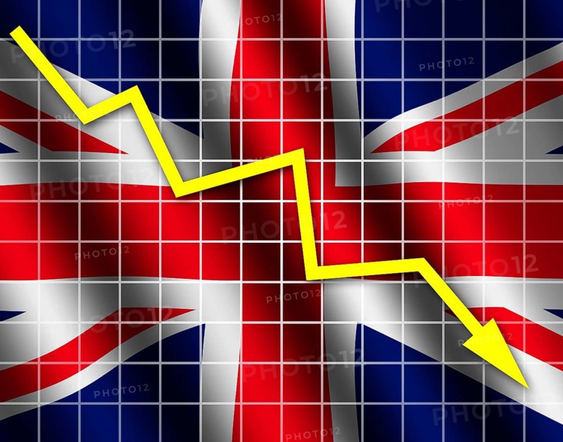 The British flag and arrow graph going down