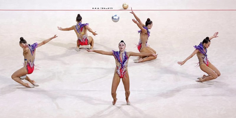 Sofia, Bulgaria - 26 March, 2021: Team Estonia perform during the 5 Balls group qualifications at the 2021 Rhythmic Gymnastics Sofia World Cup, Sofia, Bulgaria