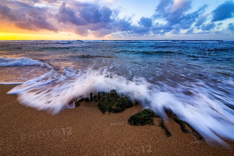 A dramatic sunset looking over the Pacific Ocean. Kauai, Hawaii