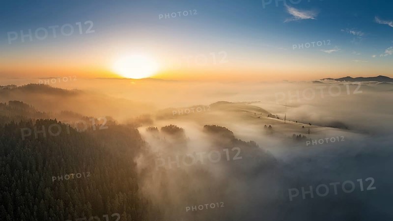 Fog at sunrise near the village of Chmelnica near Stara Lubovna in Slovakia