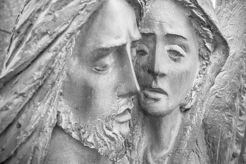 Bas-relief in bronze representing The Pity of Michelangelo. Faces of Holy Mary mother and Jesus Christ after the Crucifixion