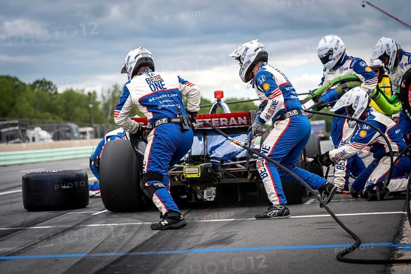 LINUS LUNDQVIST (R) (8) of Stockholm, Sweden comes down pit road for service during the XPEL Grand Prix at Road America in Elkhart Lake, WI