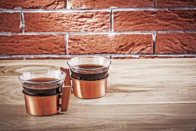 Two copper coffe cups in vintage interior