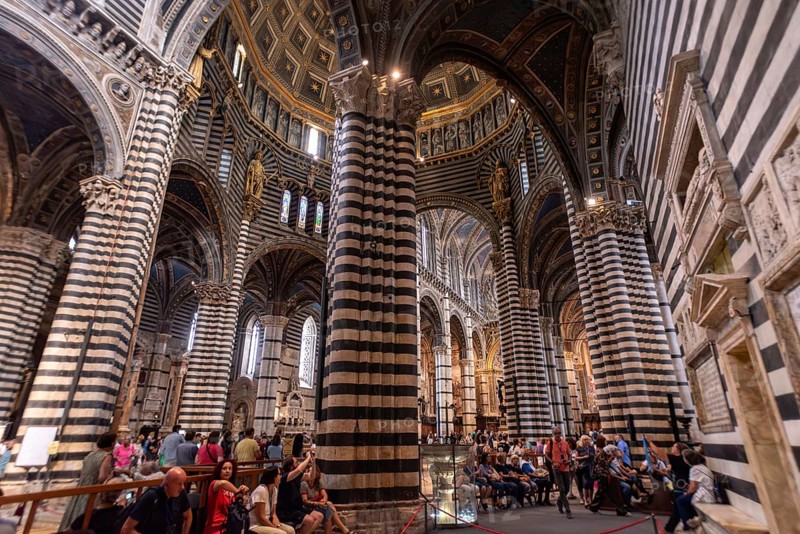 SIENA, ITALY, SEPTEMBER 23, 2023, Great medieval architecture of the Siena cathedral's nave, Italy
