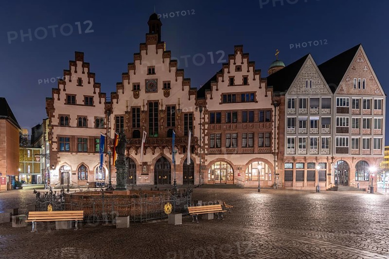 Half-timbered houses in a historic city centre, wheelhouse on the Römerberg taken in the morning without people at sunrise. Frankfurt on the Main