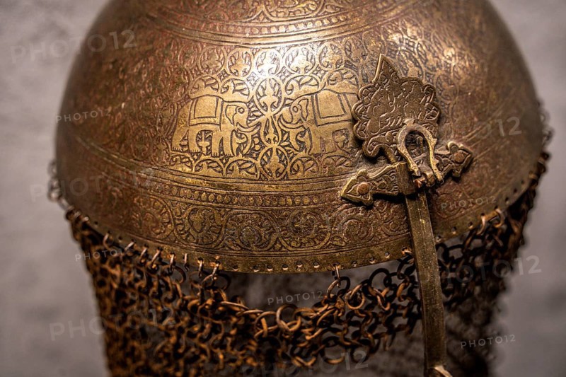 Persian helmet with engraved elephant scene, 16th century, Álava Armory Museum, Vitoria, Basque Country, Spain