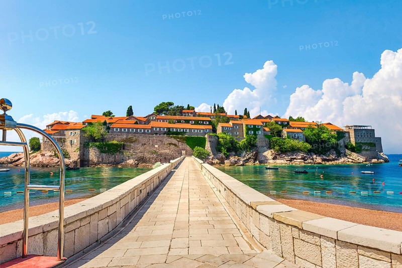 Road to Sveti Stefan, peninsula with ancient architecture in Adriatic sea