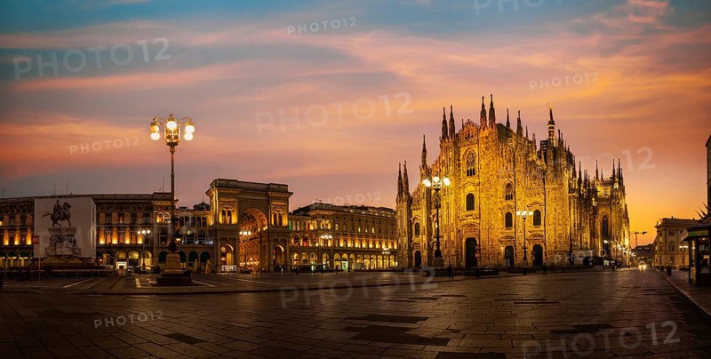Cathedral on the Duomo square in Milan at sunrise, Italy