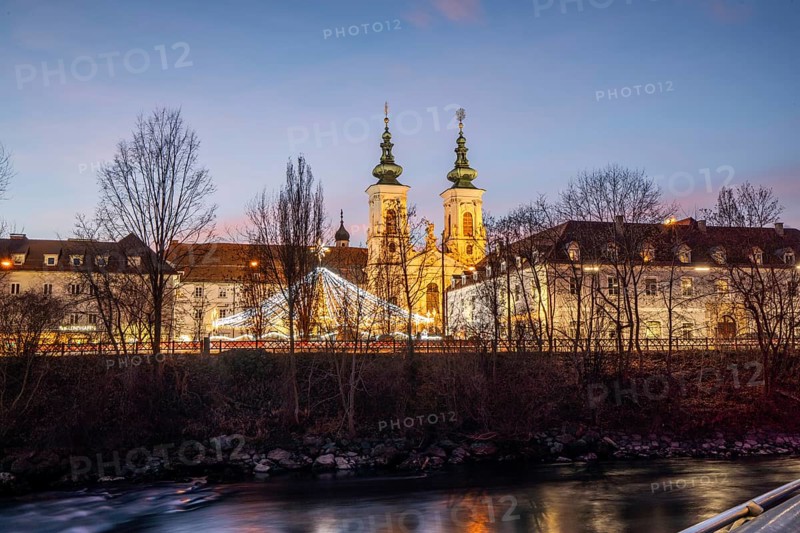 Illuminated Mariahilferkirche, river Mur, blue hour, Graz, Styria, Austria