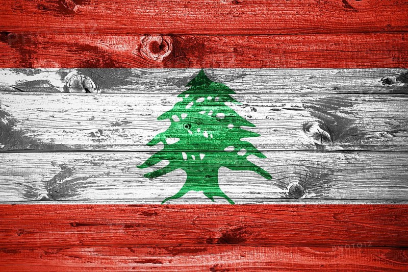 Lebanon flag on wooden planks background wood flag