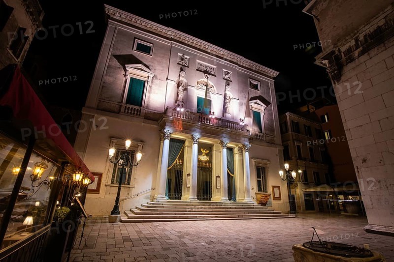 Entrance area, facade of the opera house Teatro la Fenice, night shot, Venice, Veneto, Northern Italy, Italy