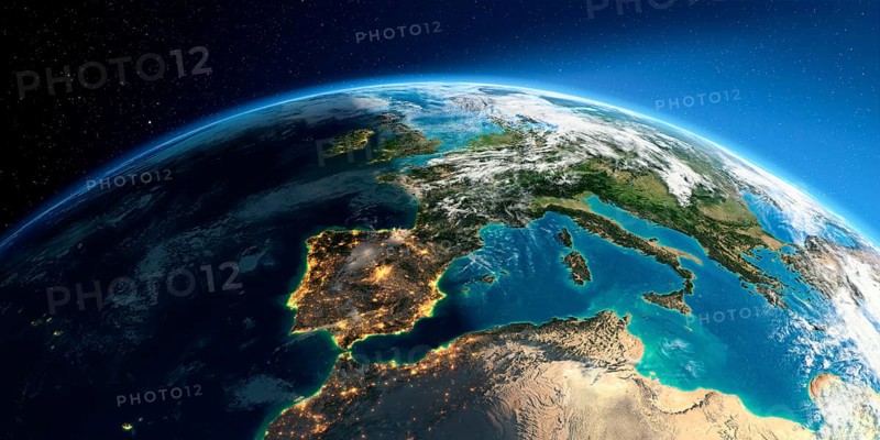 Highly detailed Earth with atmosphere, exaggerated relief and light-flooded cities. Transition from night to day. Part of Europe, the Mediterranean Sea. 3D rendering. Elements of this image furnished by NASA