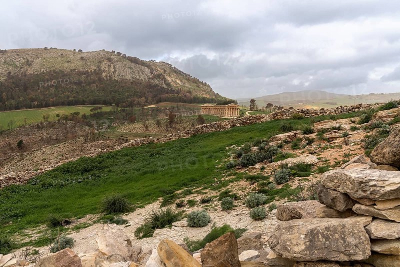 Calatafimi-Segesta, Italy, 4 January, 2024: landscape of Segesta with the ancient Greek temple under an overcast sky