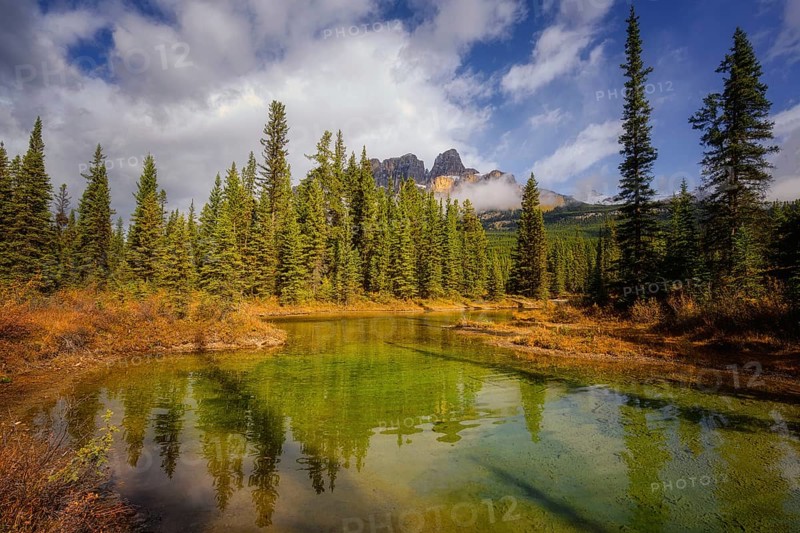 Beautiful autumn landscape scene in lake and mountain in background in west Canada