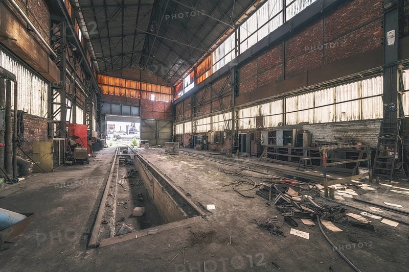 Dark, abandoned industrial hall with metal structures and rubbish on the floor, HF4 steelworks, Lost Place, Dampremy, Charleroi, Province of Hainaut, Belgium