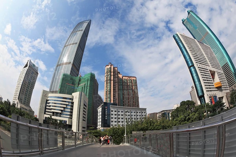 SHENZHEN - CITY IN SOUTH OF PEOPLE'S REPUBLIC OF CHINA - NOVEMBER 19, 2011: The magnificent modern city with wide prospectuses and skyscrapers.Pedestrian bridge in the city center