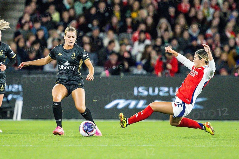 MELBOURNE, AUSTRALIA, MAY 24: Kyra Cooney-Cross of Arsenal Women FC competes against Danika Matos of A-League All Stars Women team during the Global Football Week at Marvel Stadium on May 24, 2024 in Melbourne, Australia