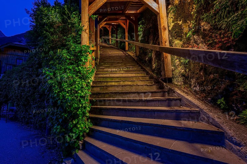 Illuminated village steps in Hallstatt, Austria
