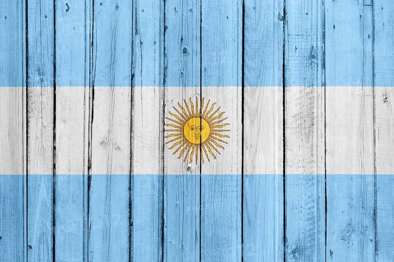 The Argentine flag painted on a wooden fence