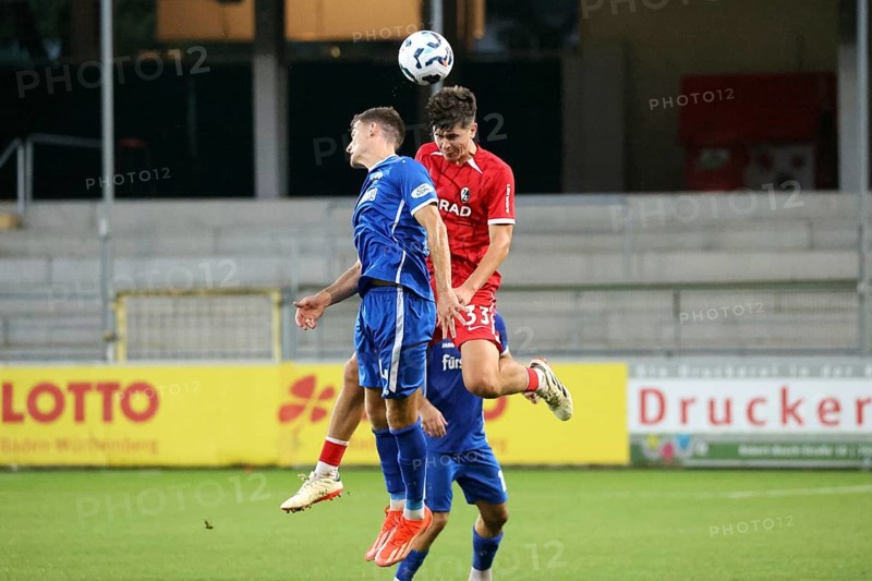 Header duel against Rico Wehrle (Bahlinger SC /BSC) and Karl Steinmann (SC Freiburg II / U23) during the match of the Soccer-RL SW 24-25: 9. Sptg: SC Freiburg II vs Bahlinger SC, Freiburg im Breisgau, Germany / Germany