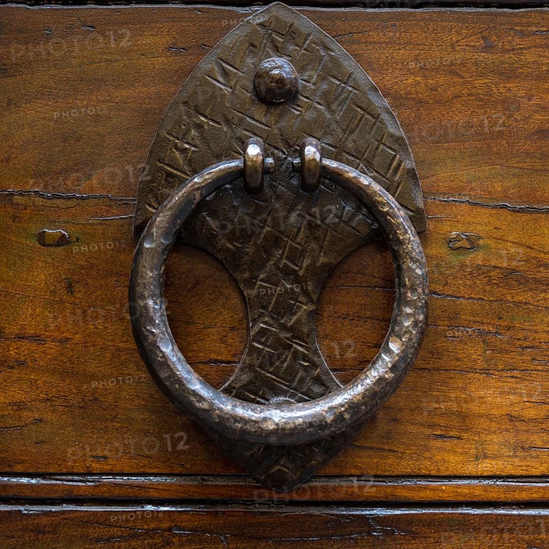 Close up of rustic old door in Spoleto, Italy