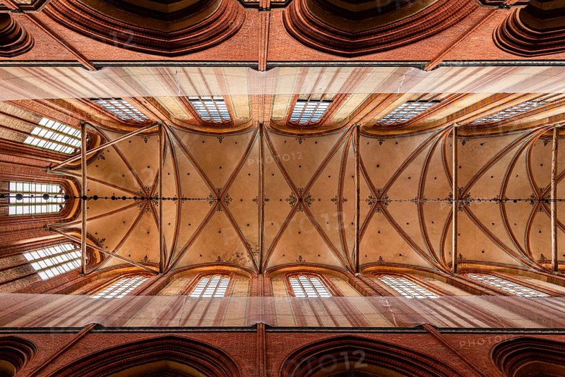Wismar, Germany, August 2, 2019: Church of St. Nicholas. Interior view directly below the vaults of the main nave