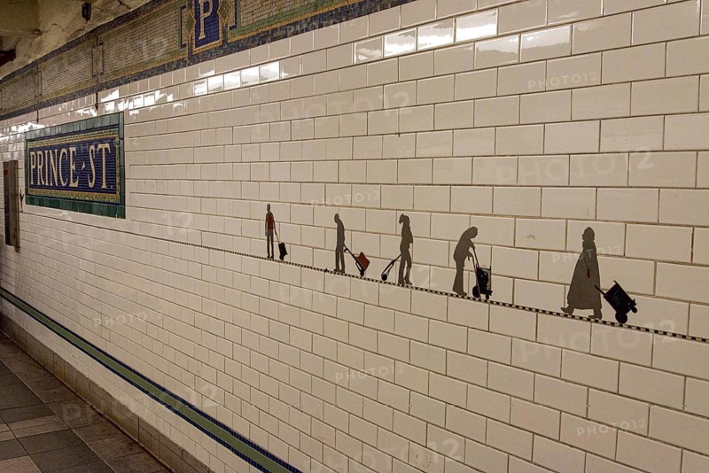 Art at the wall of subway station Prince Street in New York, USA