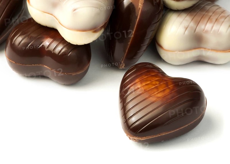Chocolates in the shape of hearts white isolated