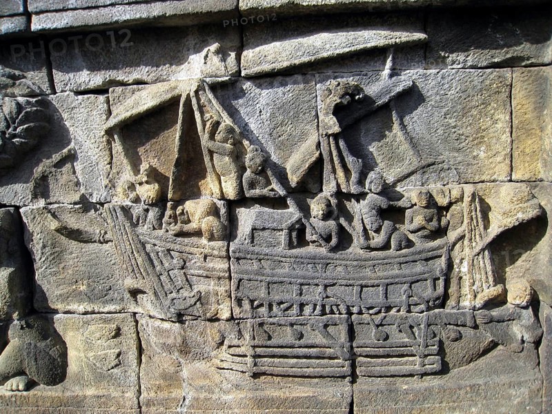 A Borobudur ship is the 8th-century wooden double outrigger, sailed vessel of Maritime Southeast Asia depicted in some bas reliefs of the Borobudur Buddhist monument in Central Java, Indonesia.<br/><br/> The ships depicted at Borobudur were most likely the type of vessels used for inter-insular trades and naval campaigns by the Sailendran and Srivijayan thalassocracy empire that ruled the region around the 7th to the 13th century.<br/><br/> The function of the outrigger was to stabilize the ship, a single or double outrigger canoe is the typical feature of the seafaring Austronesian vessels. It is considered by scholars to have been the most likely type of vessel used for their voyages and exploration across Southeast Asia, Oceania, and the Indian Ocean