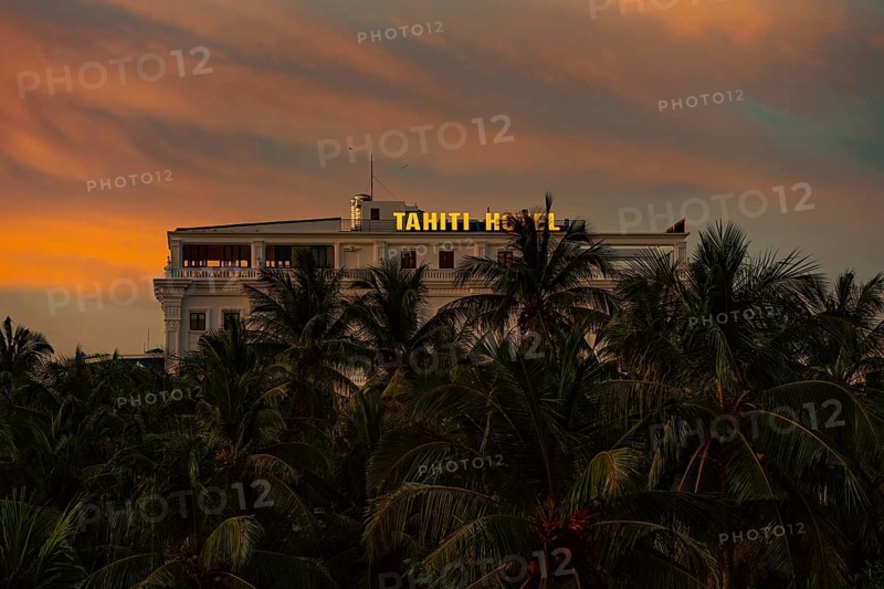 A tranquil view of a hotel amongst palm trees during sunset, nigtht, city, architecture, night lights, Phu Quoc, Vietnam