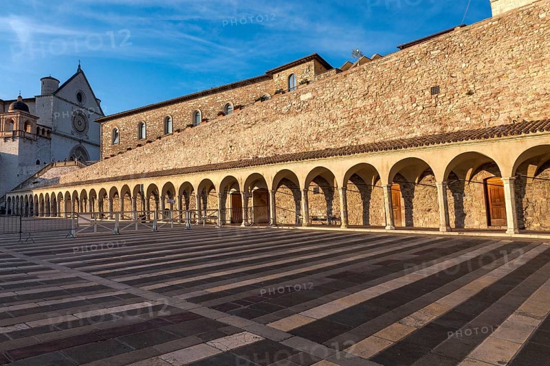 Italy: colonnade of the square in front of the cathedral of Saint Francis