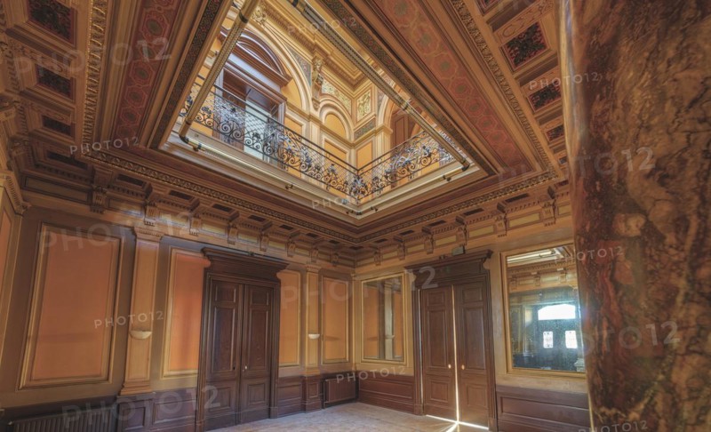 Magnificent staircase with ceiling fresco, framed by columns and elegant wooden doors, Villa Woodstock, Lost Place, Brill, Wuppertal, North Rhine-Westphalia, Germany
