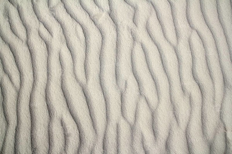 Caribbean sand waves desert pattern background beige