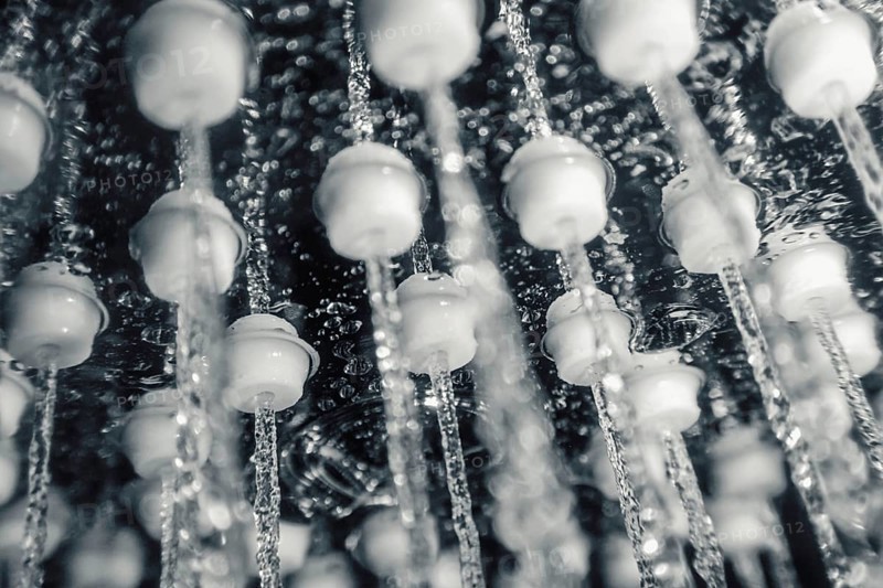 Shower head with running water closeup