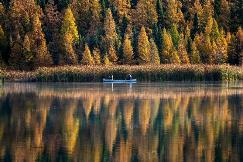 Prairie colors in fall yellow orange trees canoe calm