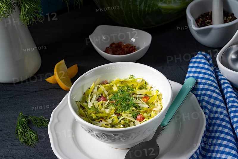 White cabbage with dill and diced bacon