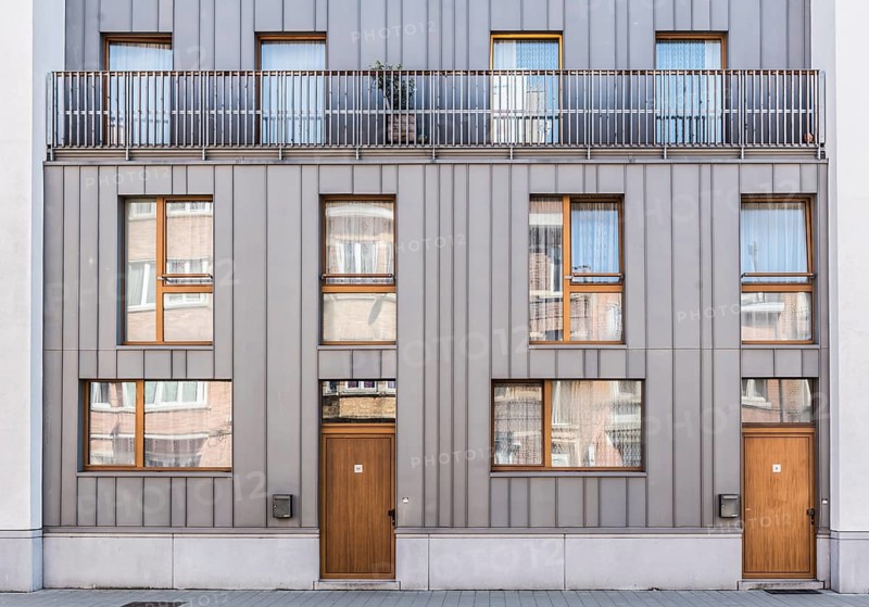 Schaerbeek, Brussels Capital, Belgium, 04 20 2019 Renovated apartment building facade